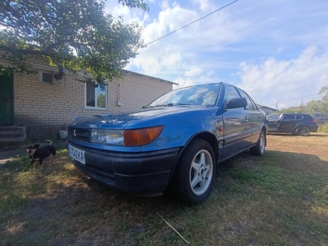 Синий Мицубиси Лансер, объемом двигателя 1.5 л и пробегом 450 тыс. км за 999 $, фото 2 на Automoto.ua