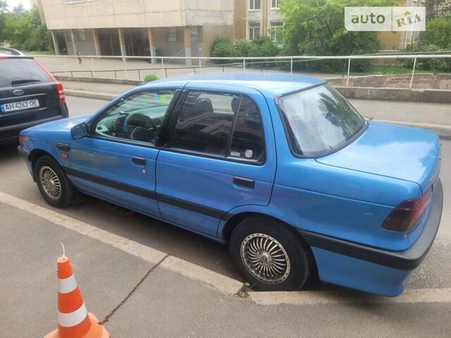 Синій Міцубісі Lancer, об'ємом двигуна 1.3 л та пробігом 250 тис. км за 3200 $, фото 3 на Automoto.ua