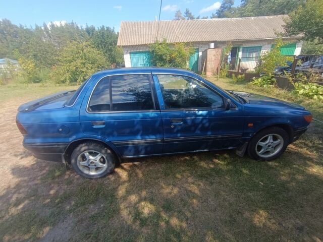 Синий Мицубиси Лансер, объемом двигателя 1.5 л и пробегом 450 тыс. км за 999 $, фото 3 на Automoto.ua