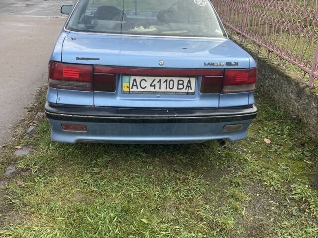 Синій Міцубісі Lancer, об'ємом двигуна 1.5 л та пробігом 330 тис. км за 1200 $, фото 3 на Automoto.ua