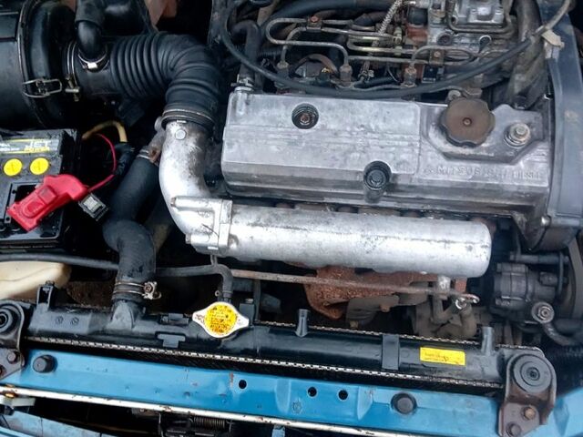 Синий Мицубиси Лансер, объемом двигателя 20 л и пробегом 250 тыс. км за 1500 $, фото 2 на Automoto.ua