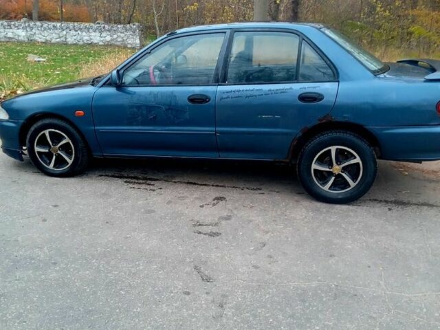 Синий Мицубиси Лансер, объемом двигателя 20 л и пробегом 250 тыс. км за 1500 $, фото 6 на Automoto.ua