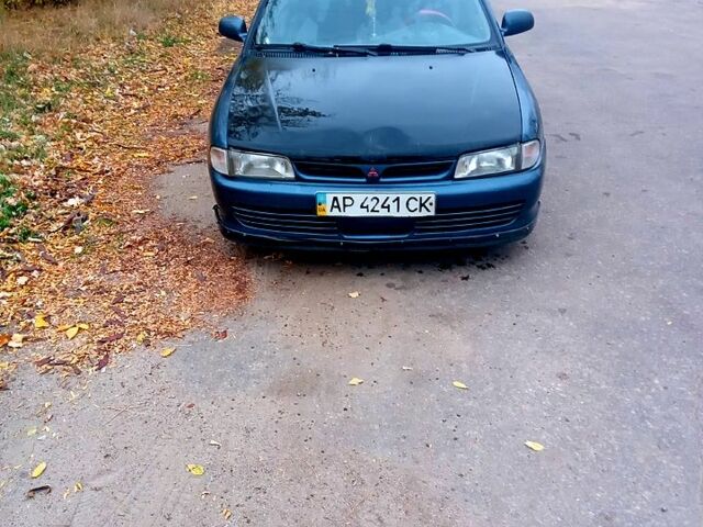 Синий Мицубиси Лансер, объемом двигателя 20 л и пробегом 250 тыс. км за 1500 $, фото 3 на Automoto.ua