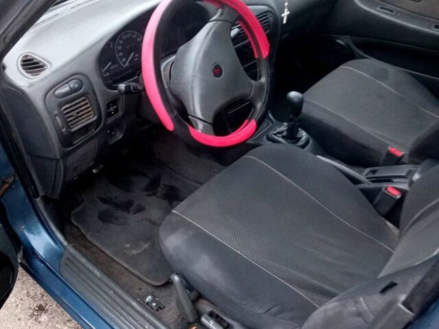 Синий Мицубиси Лансер, объемом двигателя 20 л и пробегом 250 тыс. км за 1500 $, фото 1 на Automoto.ua