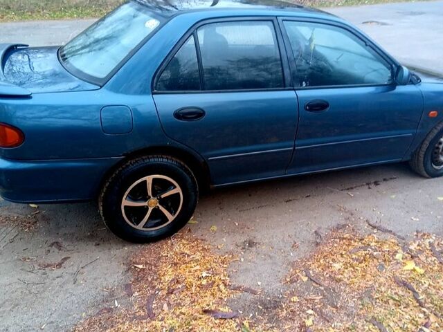 Синий Мицубиси Лансер, объемом двигателя 20 л и пробегом 250 тыс. км за 1500 $, фото 4 на Automoto.ua