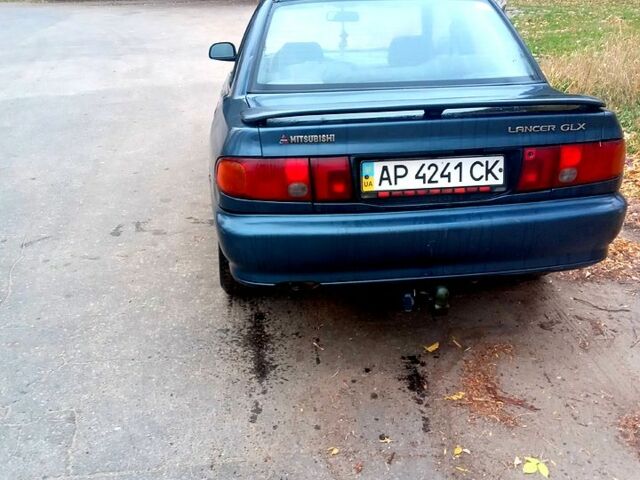 Синий Мицубиси Лансер, объемом двигателя 20 л и пробегом 250 тыс. км за 1500 $, фото 5 на Automoto.ua