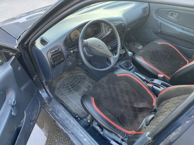 Синий Мицубиси Лансер, объемом двигателя 1.3 л и пробегом 250 тыс. км за 800 $, фото 8 на Automoto.ua