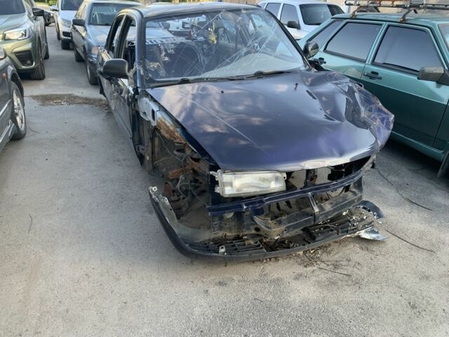 Синий Мицубиси Лансер, объемом двигателя 1.3 л и пробегом 250 тыс. км за 800 $, фото 11 на Automoto.ua