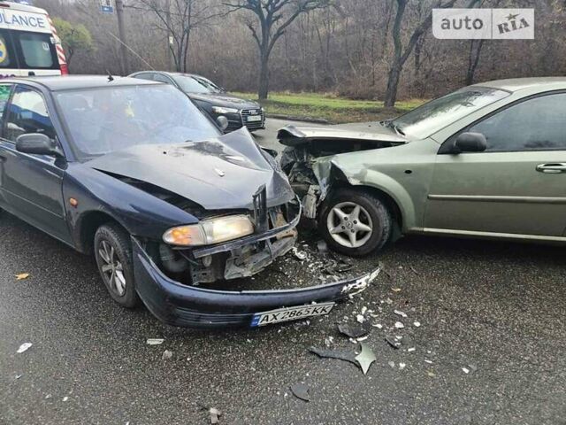 Синій Міцубісі Lancer, об'ємом двигуна 1.3 л та пробігом 328 тис. км за 600 $, фото 1 на Automoto.ua