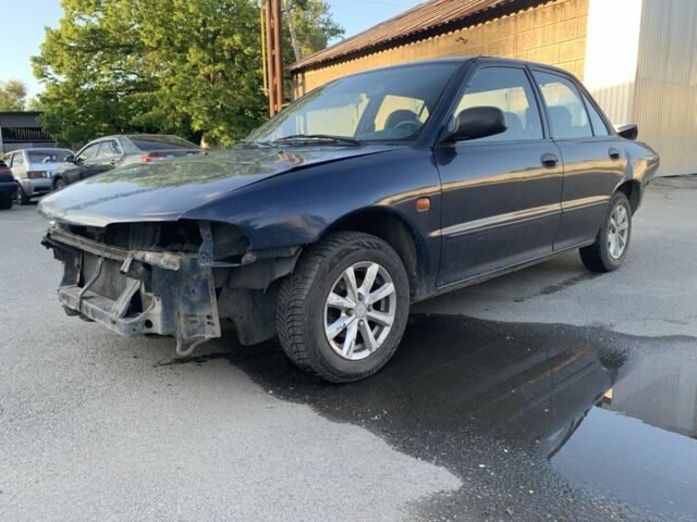 Синий Мицубиси Лансер, объемом двигателя 1.3 л и пробегом 250 тыс. км за 800 $, фото 2 на Automoto.ua