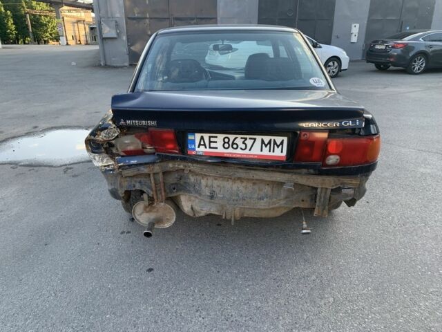 Синий Мицубиси Лансер, объемом двигателя 1.3 л и пробегом 250 тыс. км за 800 $, фото 5 на Automoto.ua