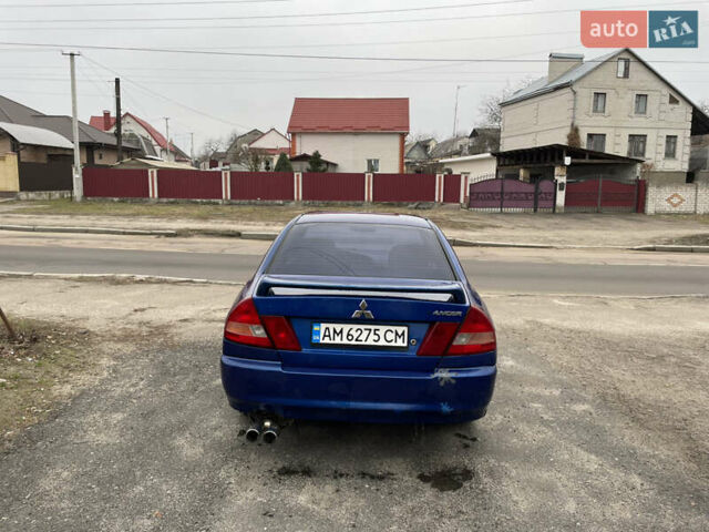 Синий Мицубиси Лансер, объемом двигателя 1.3 л и пробегом 250 тыс. км за 1000 $, фото 5 на Automoto.ua