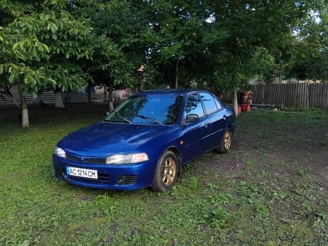 Синий Мицубиси Лансер, объемом двигателя 1.3 л и пробегом 3 тыс. км за 1399 $, фото 6 на Automoto.ua