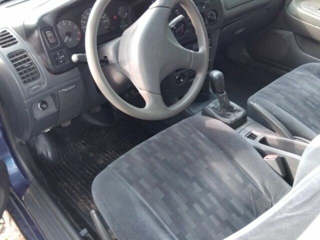 Синий Мицубиси Лансер, объемом двигателя 1.3 л и пробегом 3 тыс. км за 1399 $, фото 3 на Automoto.ua