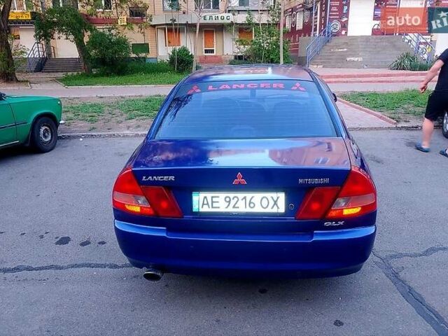 Синий Мицубиси Лансер, объемом двигателя 1.3 л и пробегом 270 тыс. км за 2100 $, фото 6 на Automoto.ua