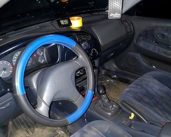 Синий Мицубиси Лансер, объемом двигателя 1.3 л и пробегом 270 тыс. км за 2100 $, фото 2 на Automoto.ua