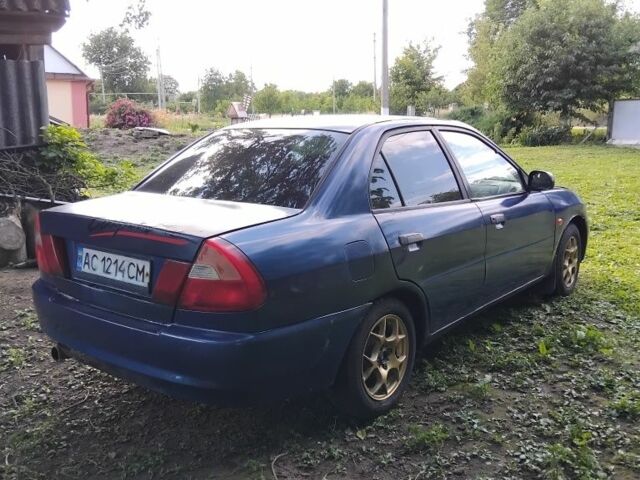 Синий Мицубиси Лансер, объемом двигателя 1.3 л и пробегом 3 тыс. км за 1399 $, фото 5 на Automoto.ua