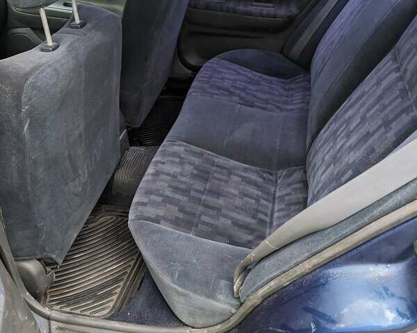 Синій Міцубісі Lancer, об'ємом двигуна 1.3 л та пробігом 250 тис. км за 2100 $, фото 3 на Automoto.ua