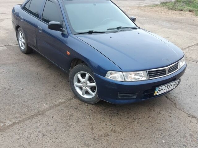 Синий Мицубиси Лансер, объемом двигателя 0 л и пробегом 240 тыс. км за 2300 $, фото 2 на Automoto.ua