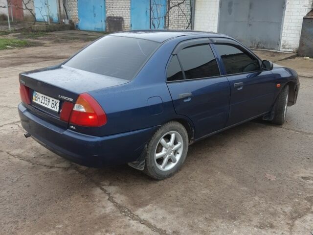 Синий Мицубиси Лансер, объемом двигателя 0 л и пробегом 240 тыс. км за 2300 $, фото 3 на Automoto.ua