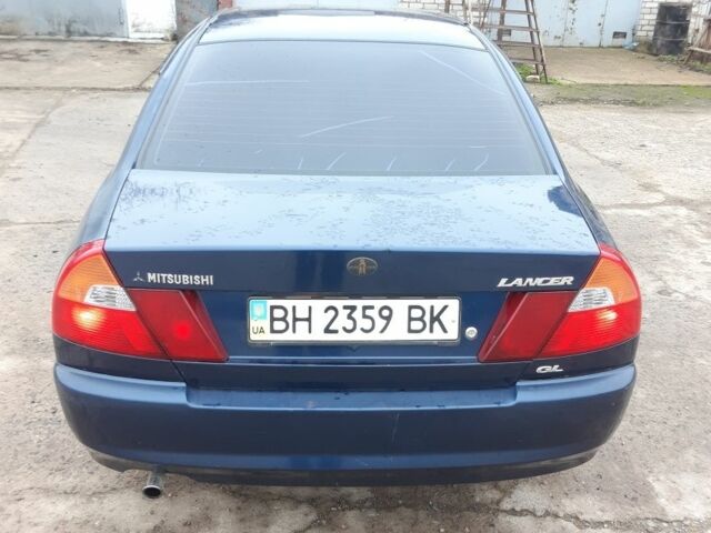 Синий Мицубиси Лансер, объемом двигателя 0 л и пробегом 240 тыс. км за 2300 $, фото 4 на Automoto.ua