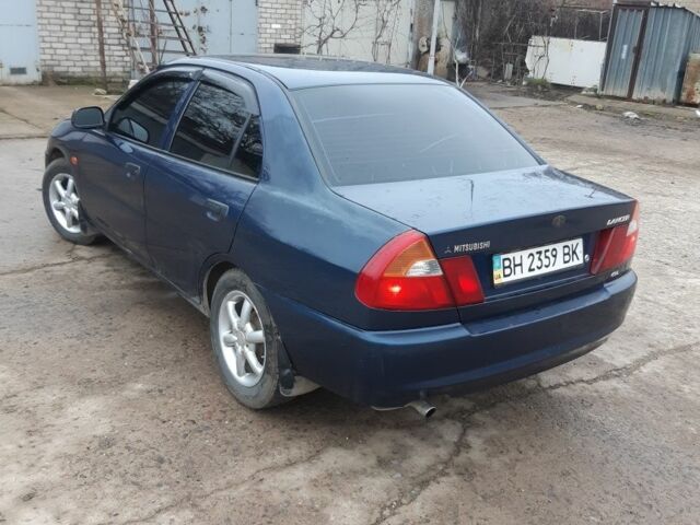 Синий Мицубиси Лансер, объемом двигателя 0 л и пробегом 240 тыс. км за 2300 $, фото 5 на Automoto.ua