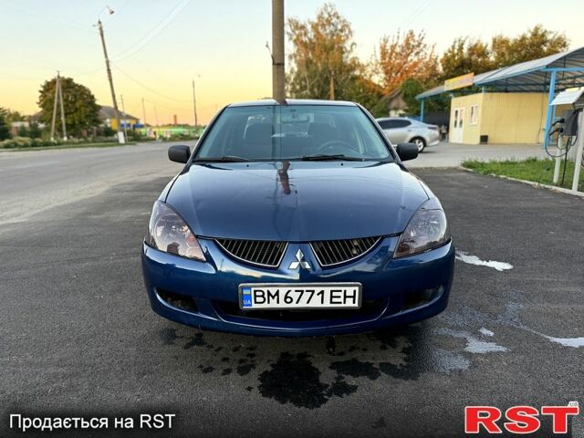 Синій Міцубісі Lancer, об'ємом двигуна 1.6 л та пробігом 150 тис. км за 3250 $, фото 1 на Automoto.ua