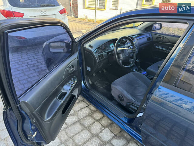Синій Міцубісі Lancer, об'ємом двигуна 1.6 л та пробігом 400 тис. км за 2600 $, фото 9 на Automoto.ua
