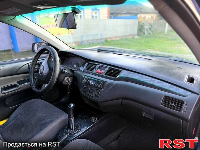 Синій Міцубісі Lancer, об'ємом двигуна 1.6 л та пробігом 150 тис. км за 3250 $, фото 4 на Automoto.ua
