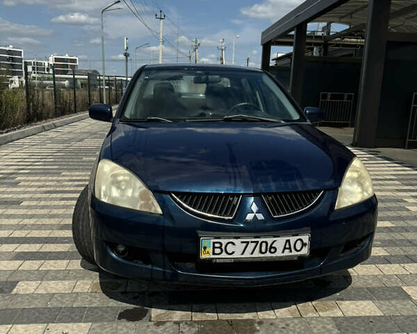 Мицубиси Лансер 2003 в Львове на Automoto.ua Синий Мицубиси Лансер, объемом двигателя 1.58 л и пробегом 400 тыс. км за 2500 $, фото 4 на Automoto.ua