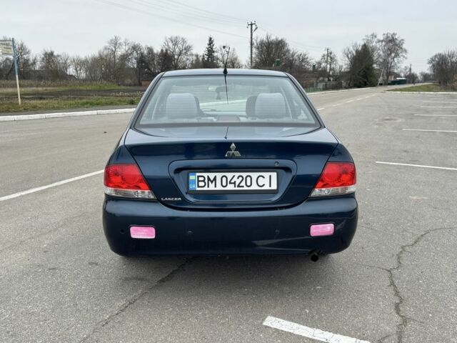 Синий Мицубиси Лансер, объемом двигателя 1.6 л и пробегом 182 тыс. км за 3500 $, фото 3 на Automoto.ua