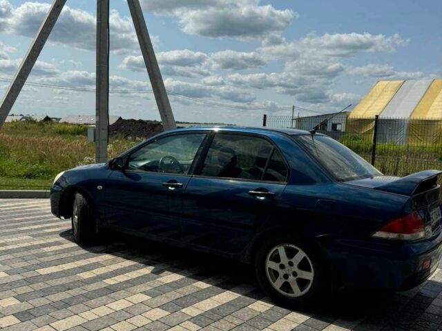 Мицубиси Лансер 2003 в Львове на Automoto.ua Синий Мицубиси Лансер, объемом двигателя 1.6 л и пробегом 400 тыс. км за 2500 $, фото 2 на Automoto.ua