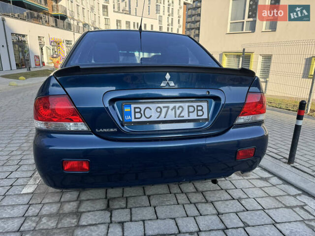 Синій Міцубісі Lancer, об'ємом двигуна 1.6 л та пробігом 400 тис. км за 2600 $, фото 4 на Automoto.ua