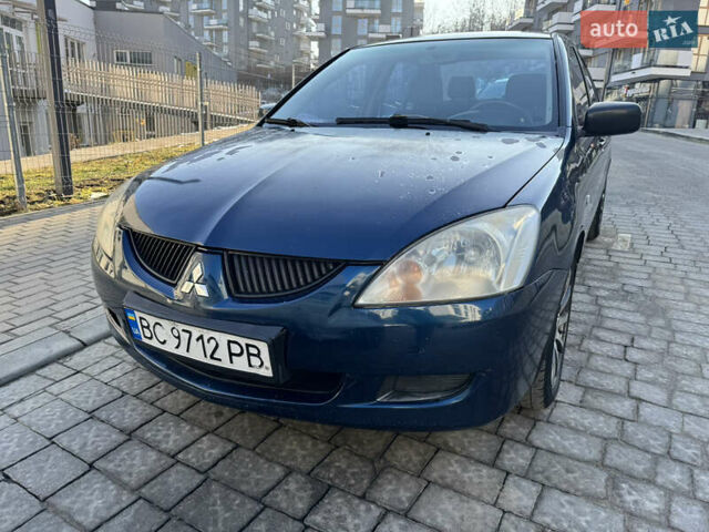 Синій Міцубісі Lancer, об'ємом двигуна 1.6 л та пробігом 400 тис. км за 2600 $, фото 1 на Automoto.ua