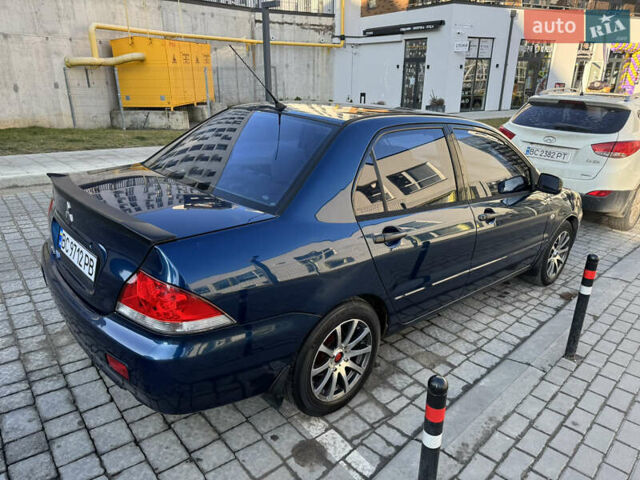 Синій Міцубісі Lancer, об'ємом двигуна 1.6 л та пробігом 400 тис. км за 2600 $, фото 5 на Automoto.ua
