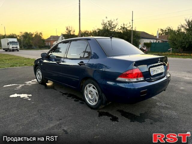 Синій Міцубісі Lancer, об'ємом двигуна 1.6 л та пробігом 150 тис. км за 3250 $, фото 2 на Automoto.ua