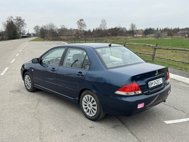 Синий Мицубиси Лансер, объемом двигателя 1.6 л и пробегом 182 тыс. км за 3500 $, фото 2 на Automoto.ua