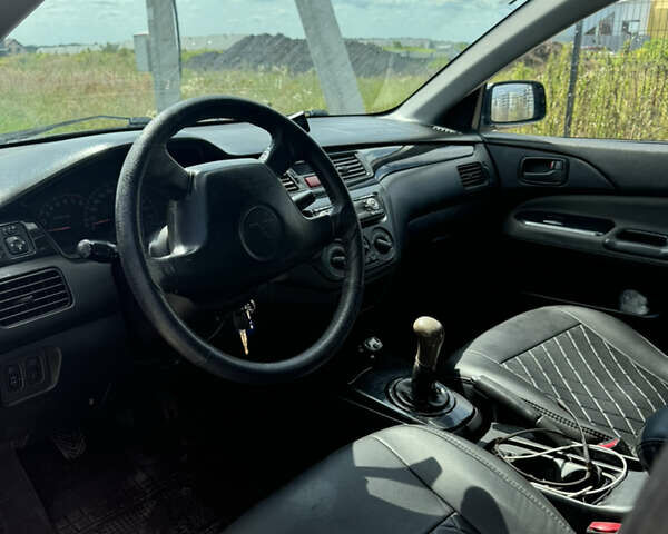 Мицубиси Лансер 2003 в Львове на Automoto.ua Синий Мицубиси Лансер, объемом двигателя 1.58 л и пробегом 400 тыс. км за 2500 $, фото 5 на Automoto.ua