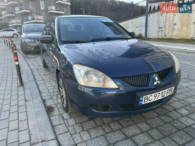 Синій Міцубісі Lancer, об'ємом двигуна 1.6 л та пробігом 400 тис. км за 2600 $, фото 8 на Automoto.ua