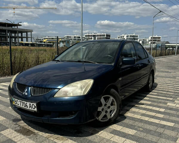 Мицубиси Лансер 2003 в Львове на Automoto.ua Синий Мицубиси Лансер, объемом двигателя 1.58 л и пробегом 400 тыс. км за 2500 $, фото 2 на Automoto.ua