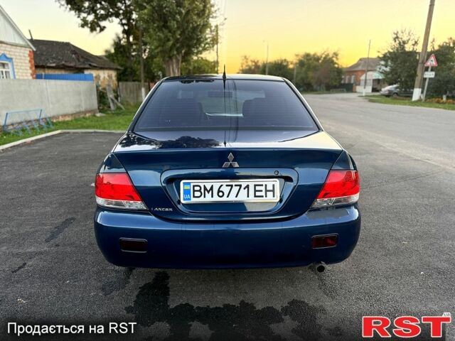 Синій Міцубісі Lancer, об'ємом двигуна 1.6 л та пробігом 150 тис. км за 3250 $, фото 3 на Automoto.ua