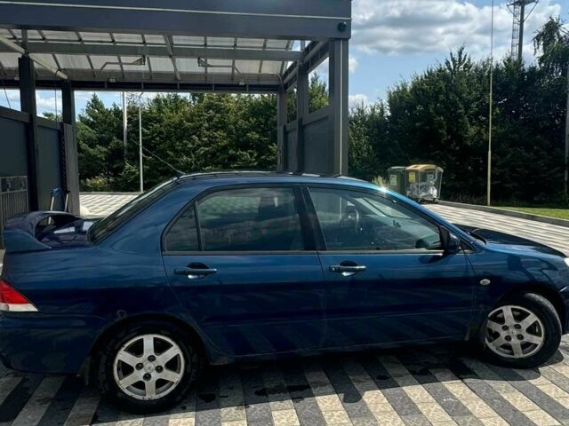 Мицубиси Лансер 2003 в Львове на Automoto.ua Синий Мицубиси Лансер, объемом двигателя 1.6 л и пробегом 400 тыс. км за 2500 $, фото 1 на Automoto.ua