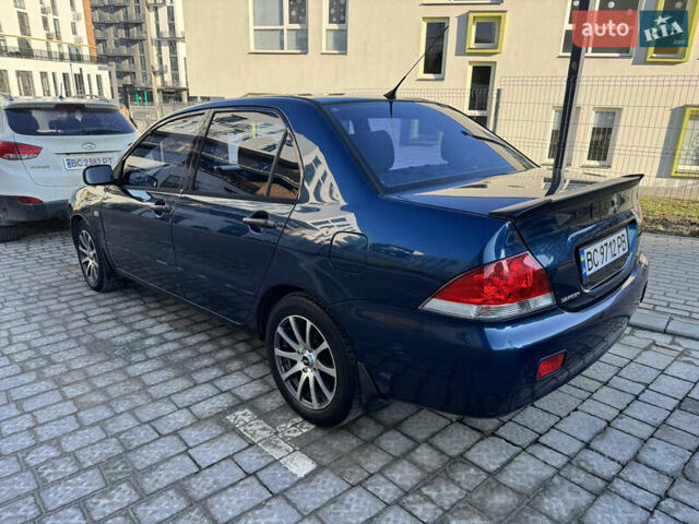 Синій Міцубісі Lancer, об'ємом двигуна 1.6 л та пробігом 400 тис. км за 2600 $, фото 3 на Automoto.ua