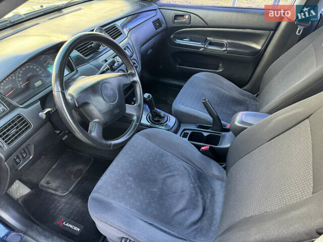 Синій Міцубісі Lancer, об'ємом двигуна 1.6 л та пробігом 400 тис. км за 2600 $, фото 10 на Automoto.ua
