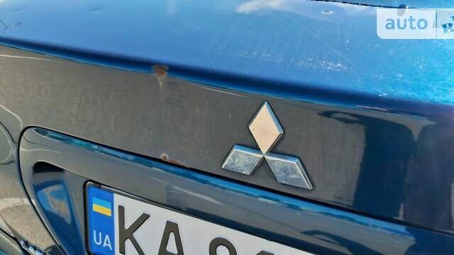 Синій Міцубісі Lancer, об'ємом двигуна 1.3 л та пробігом 255 тис. км за 3100 $, фото 11 на Automoto.ua