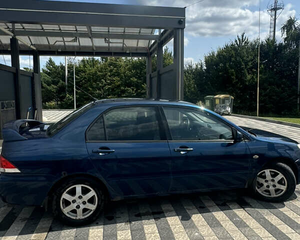 Мицубиси Лансер 2003 в Львове на Automoto.ua Синий Мицубиси Лансер, объемом двигателя 1.58 л и пробегом 400 тыс. км за 2500 $, фото 3 на Automoto.ua