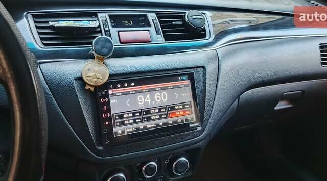 Синий Мицубиси Лансер, объемом двигателя 1.58 л и пробегом 411 тыс. км за 3000 $, фото 5 на Automoto.ua
