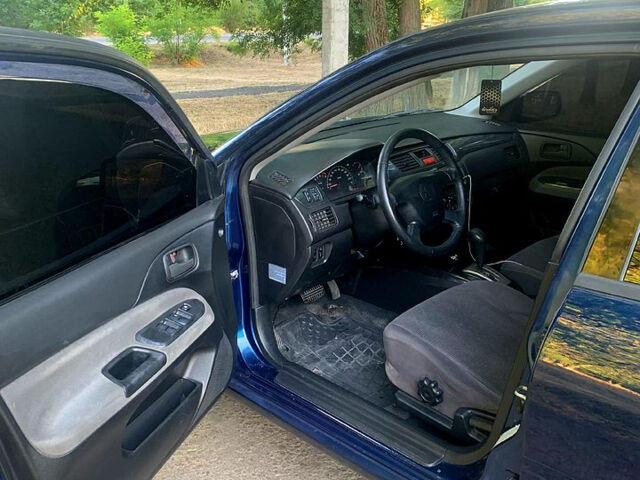 Синий Мицубиси Лансер, объемом двигателя 1.6 л и пробегом 295 тыс. км за 4550 $, фото 9 на Automoto.ua