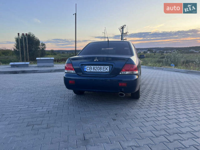 Синий Мицубиси Лансер, объемом двигателя 1.3 л и пробегом 290 тыс. км за 2999 $, фото 8 на Automoto.ua