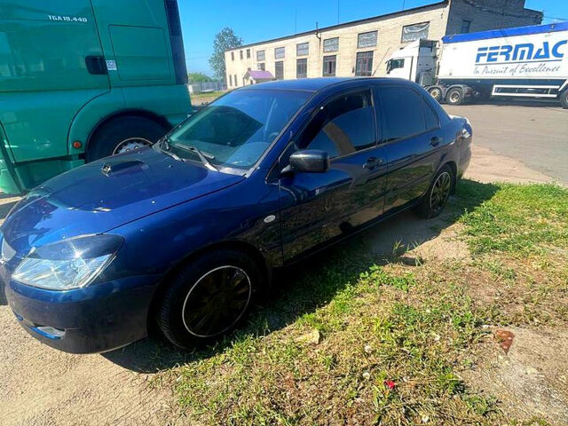 Синій Міцубісі Lancer, об'ємом двигуна 1.6 л та пробігом 239 тис. км за 3800 $, фото 8 на Automoto.ua